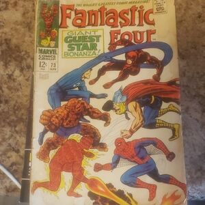 Marvel Fantastic Four Comic Cover with Red, Blue, Orange, Yellow Accents